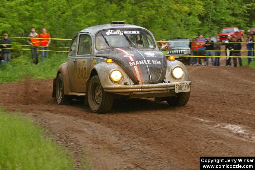 Mark Huebbe / John Huebbe drift their VW Beetle past spectators on SS6.