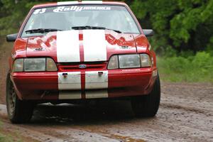 Mark Utecht / Rob Bohn drift their Ford Mustang through a sweeper on SS4.