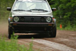 Dave Cizmas / Matt Himes drift their VW GTI through a sloppy sweeper on SS4.