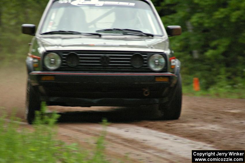 Dave Cizmas / Matt Himes drift their VW GTI through a sloppy sweeper on SS4.