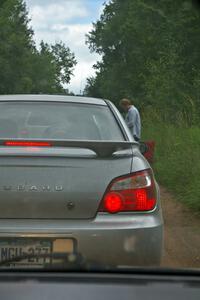 Ben Slocum was in charge of the start of SS1 and chats with the line of marshals as they head into the forest.