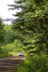 Kazimierz Pudelek / Michal Nawracaj blast their Subaru Impreza down a straight on SS2.