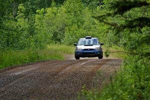 Slawomir Balda / Piotr Boczek at speed down a straight on SS2 in their Subaru WRX.