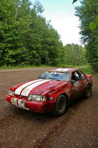 The Mark Utecht / Rob Bohn Ford Mustang rolled hard on SS2 and damage was heavy.
