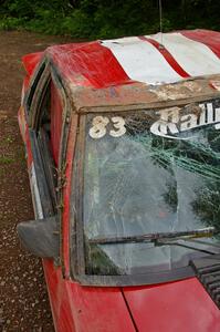 Heavy damage to the co-driver's side of the Ford Mustang of Mark Utecht / Rob Bohn after its roll on SS2.