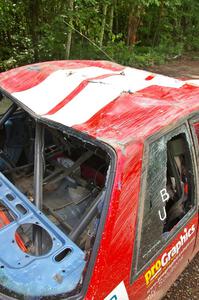 Heavy damage to the roofline after the roll of the Mark Utecht / Rob Bohn Ford Mustang.