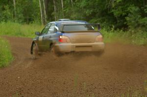 Slawomir Balda / Piotr Boczek power through a sweeper on SS4 in their Subaru WRX.