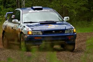 Mason Moyle / Scott Putnam drift their Subaru Impreza out of a sweeper on SS4.