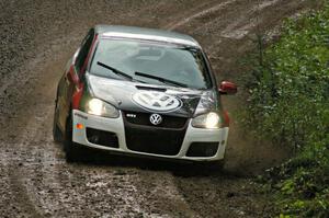 The Brian Dondlinger / Dave Parps VW GTI-Rally drifts nicely through a sloppy downhill sweeper on SS5.