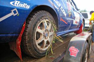 Grass stuffed between the wheel and tire on the Carl Siegler / David Goodman Subaru WRX STi .