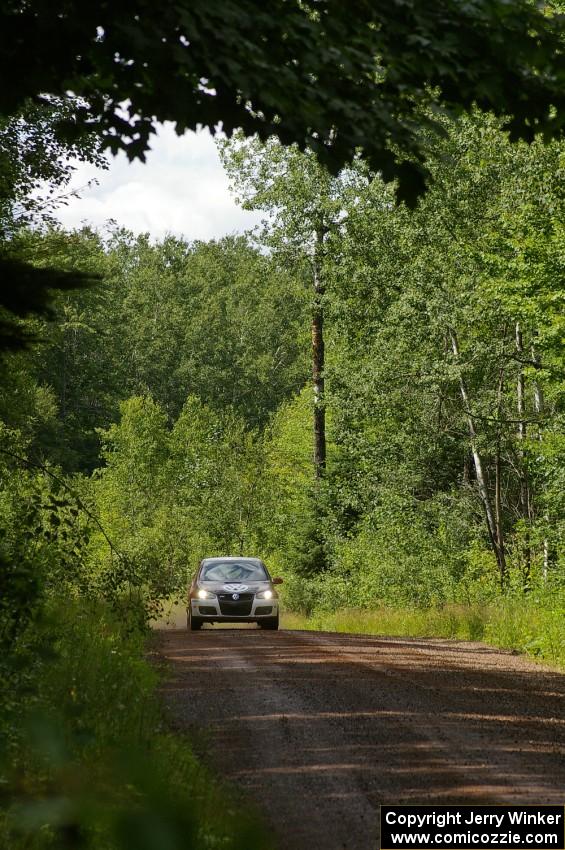 Brian Dondlinger / Dave Parps at speed down a straight on SS2 in their VW GTI-Rally.