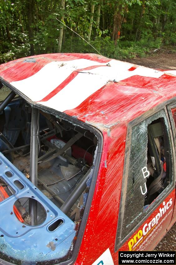 Heavy damage to the roofline after the roll of the Mark Utecht / Rob Bohn Ford Mustang.