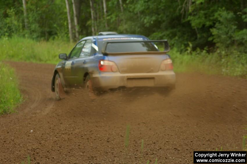 Slawomir Balda / Piotr Boczek power through a sweeper on SS4 in their Subaru WRX.