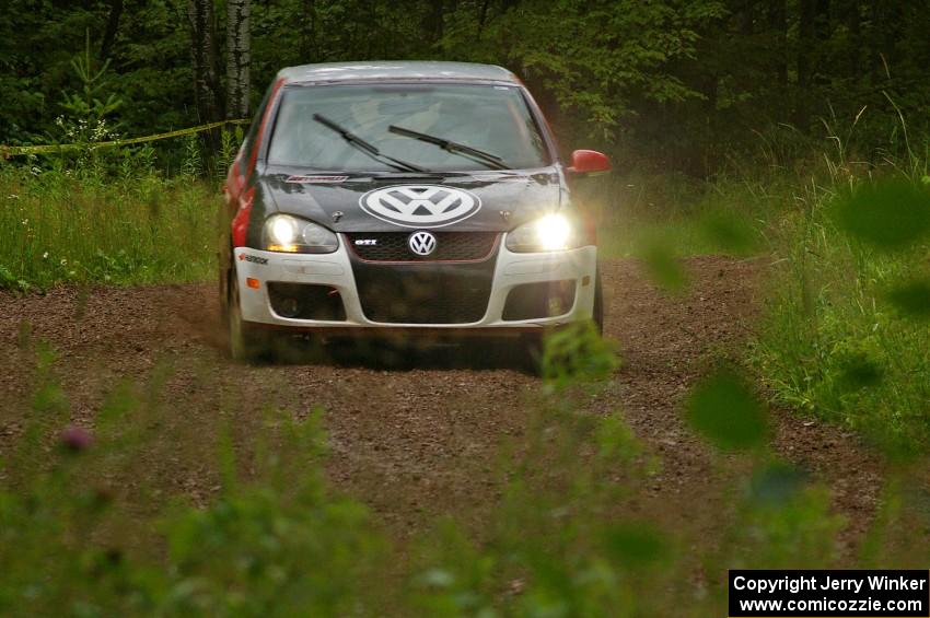 Brian Dondlinger / Dave Parps drift through a sweeper on SS4 in their VW GTI-Rally.