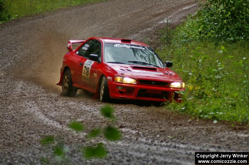 Dustin Kasten / Corina Soto do a little ditch-hooking on SS5 in their Subaru Impreza.