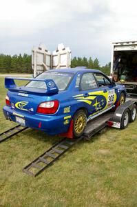 Janusz Topor / Michal Kaminski unload their freshly-prepped open class Subaru WRX STi off the trailer.