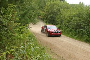 Mark Utecht / Rob Bohn blast down a straight on the practice stage in their Ford Mustang.