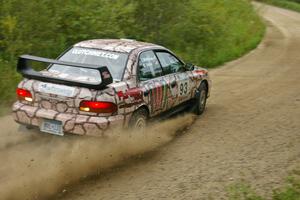 The Bob Olson / Conrad Ketelsen Subaru Impreza sets up for a left-hander on the practice stage.