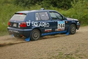 Paul Koll / Heath Nunnemacher take a fast left-hander on the practice stage in their VW Golf.