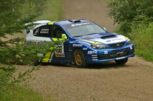 Travis Pastrana / Christian Edstrom shake their Subaru WRX STi down on the practice stage.(1)