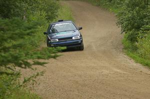 Paul Koll / Heath Nunnemacher set up for fast left-hander on the practice stage in their VW Golf.