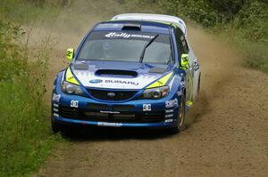 Travis Pastrana / Christian Edstrom blast past in their Subaru WRX STi on a right-hander on the practice stage.