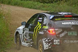 Dave Mirra / Derek Ringer prepared for a left-hander on the practice stage in their Subaru WRX STi.