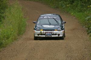 Chris Greenhouse / Don DeRose starting to feel the effects of the rain at the practice stage in their Plymouth Neon.