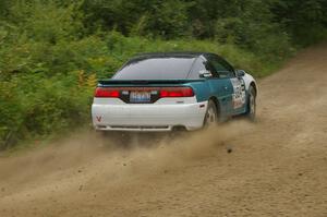 Adam Markut / Chris Gordon drift their Eagle Talon through a left-hander on the practice stage.