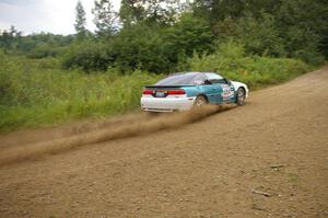 Adam Markut / Chris Gordon do a faster drift in their Eagle Talon than on previous practice attempts.