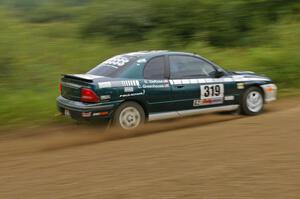 Chris Greenhouse / Don DeRose make a final run on the practice stage in their Plymouth Neon.