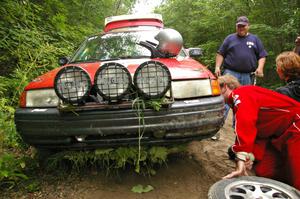 The Paul Donlin / Elliot Sherwood Ford Escort with a skidplate full of leaves after the practice stage.