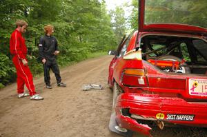 Paul Donlin / Elliot Sherwood Ford Escort after practice. The bumper sticker says it all!