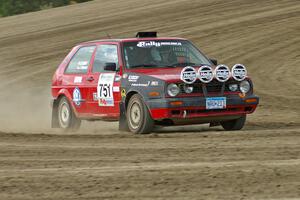 John Kimmes / Greg Smith VW GTI on the high bank on SS1.