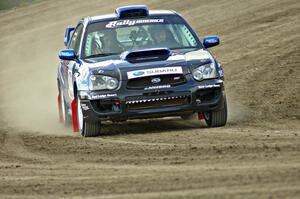 Carl Siegler / David Goodman Subaru WRX STi on the high bank on SS1.