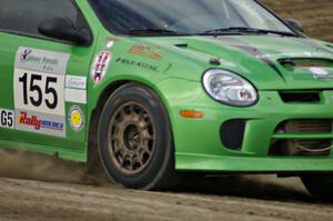 John Conley / Keith Rudolph drive their Dodge SRT-4 off of the high bank on SS1.