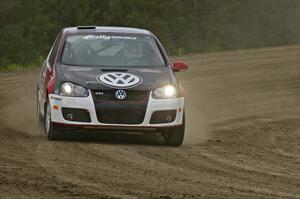 Brian Dondlinger / Dave Parps at the top of the high bank on SS1 in their VW GTI-Rally.