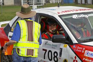 Jan Zedril / Jody Zedril visit Barbara Steencken as they check into the finish control of SS1 in their Mitsubishi Lancer ES.