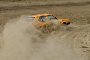 The Chad Eixenberger / Ben Slocum VW Golf drifts hard at a right hander on SS1.