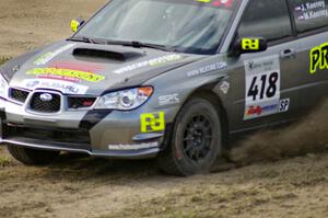 Jimmy Keeney / Missy Keeney in their Subaru WRX STi at the speedway stage, SS1.