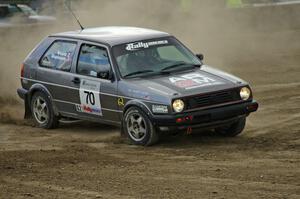 Chris Duplessis / Catherine Woods take a hard right-hand hairpin on SS1 in their VW GTI.