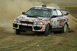 Bob Olson / Conrad Ketelsen take their Subaru Impreza through the infield of the speedway on SS1.