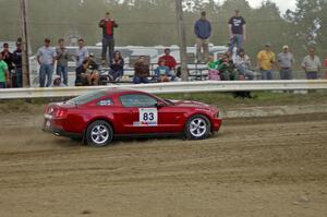 Mark Utecht / Rob Bohn cross the finish of SS1 in their Ford Mustang.