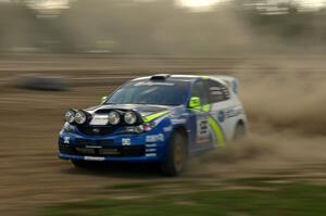 Travis Pastrana / Christian Edstrom drift their Subaru WRX STi in the SS1 speedway infield.(1)