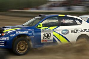 Travis Pastrana / Christian Edstrom drift their Subaru WRX STi in the SS1 speedway infield.(3)