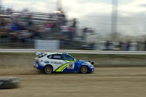 Travis Pastrana / Christian Edstrom cross the finish of SS1 in their Subaru WRX STi.