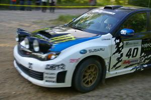 Dave Mirra / Derek Ringer fly past in their Subaru WRX STi on SS2.