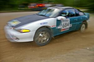 Adam Markut / Chris Gordon drift their Eagle Talon through a fast left-hander on SS2.