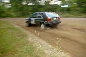 Chris Duplessis / Catherine Woods at speed through a fast left-hand sweeper on SS2 in their VW GTI.