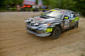 Jimmy Keeney / Missy Keeney at speed through a fast left-hander in their Subaru WRX STi on SS2.